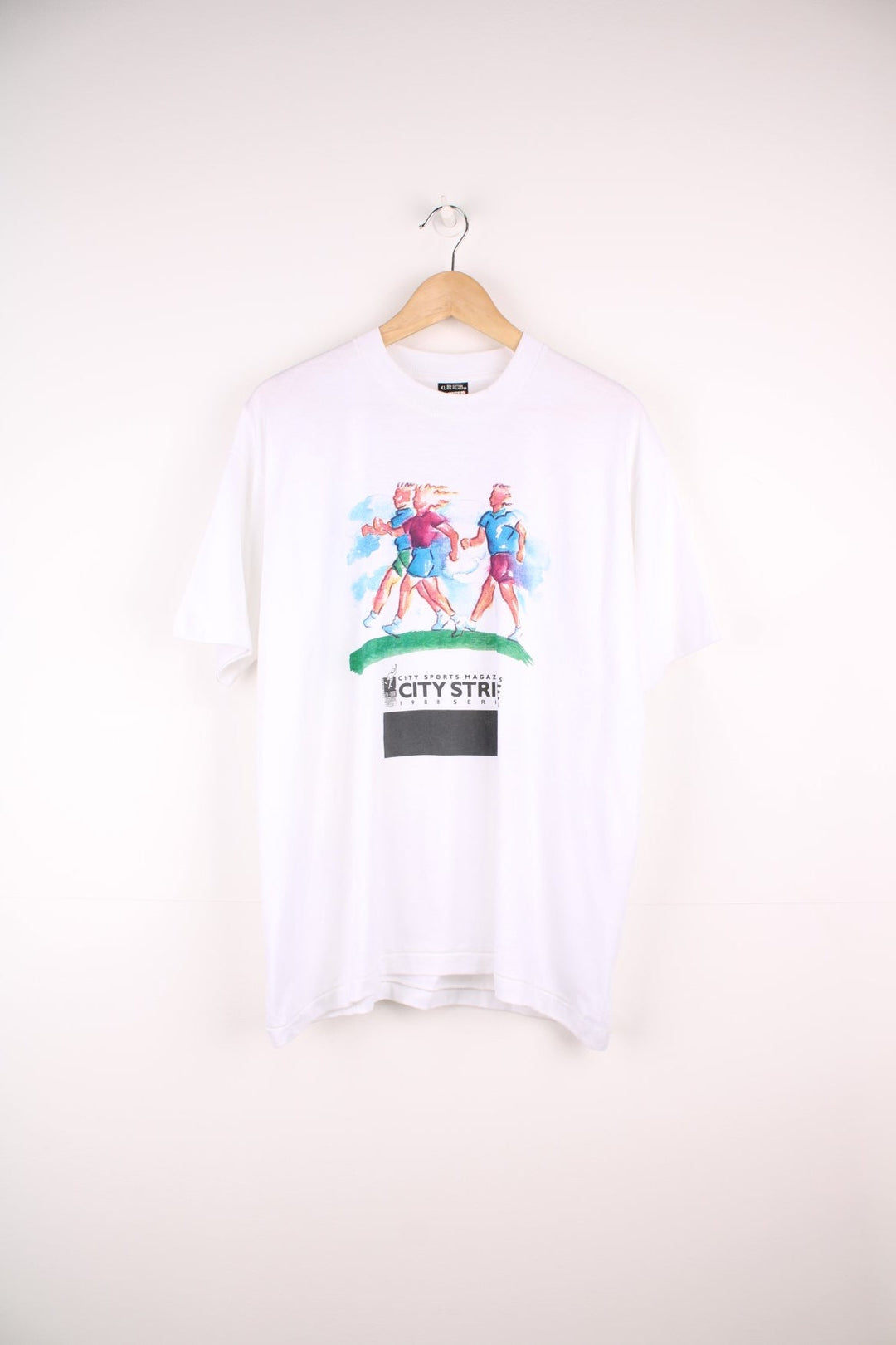 White 1988 CitySports magazine City Stride Tee with watercolour-style runner designs. 