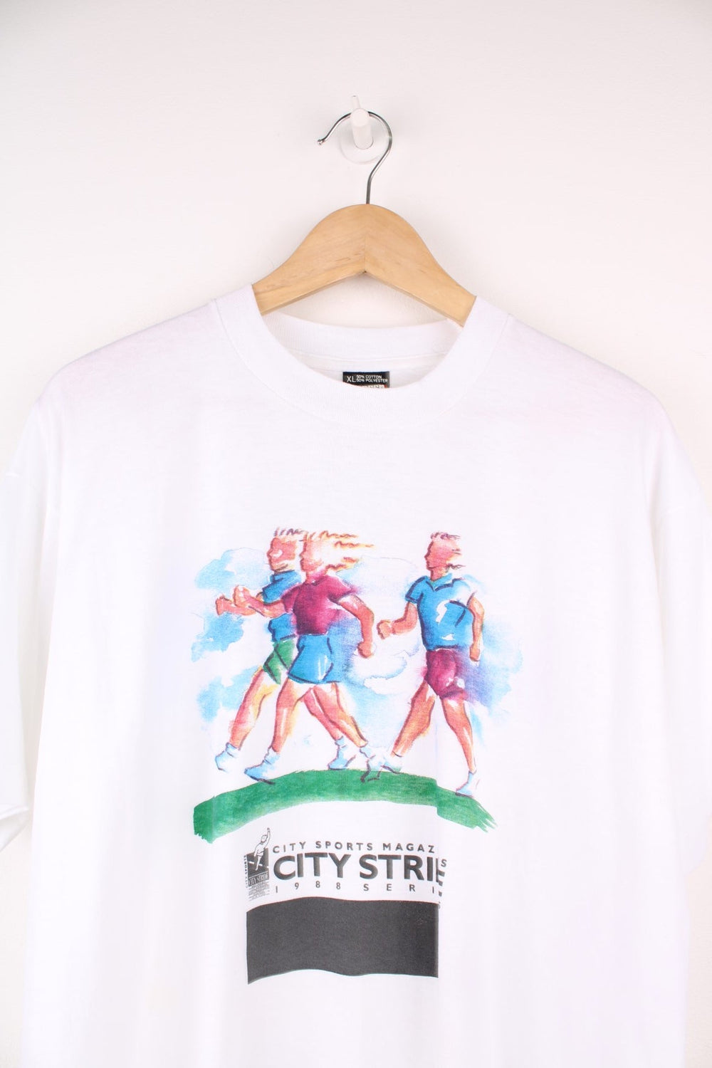 White 1988 CitySports magazine City Stride Tee with watercolour-style runner designs. 