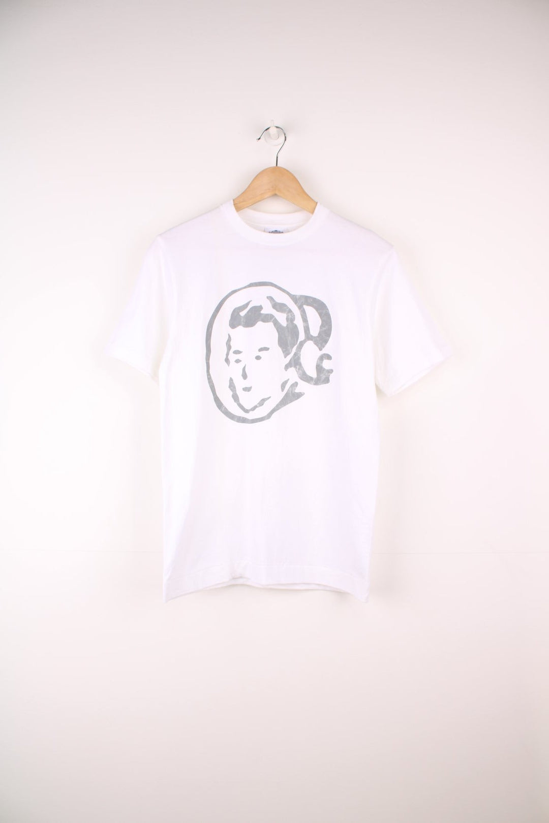 White Billionaire Boy's Club tee with face design in grey and logo on the back. 