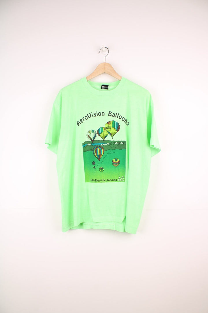 Vintage green tee with hot air balloon graphic and spellout reading 'AeroVision Balloons Gardnerville, Nevada'.