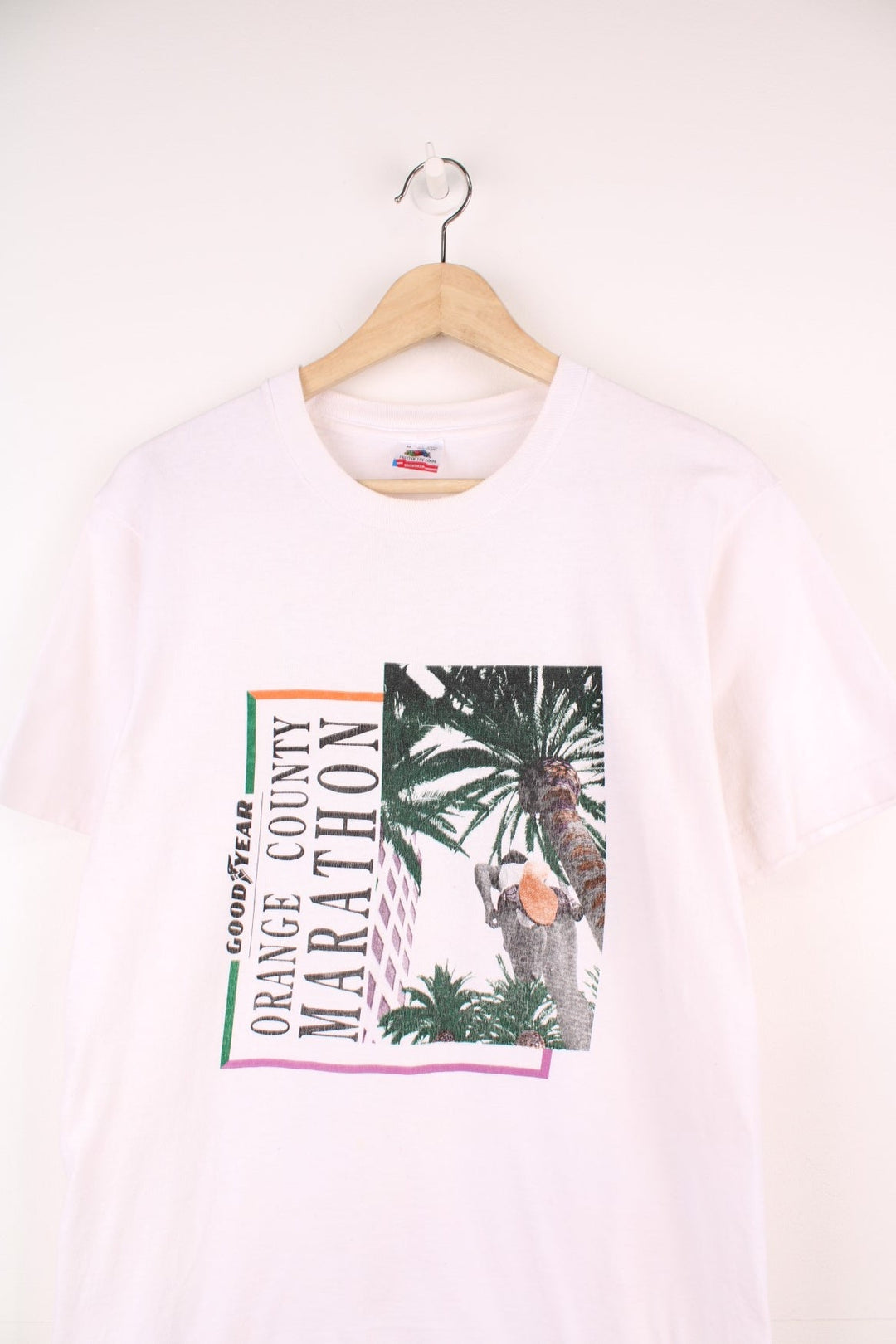 1993 white Fruit of the Loom tee with front graphic reading 'Goodyear Orange County Marathon' and back graphic reading 'November 3, 1991' and featuring brand sponsor logos.