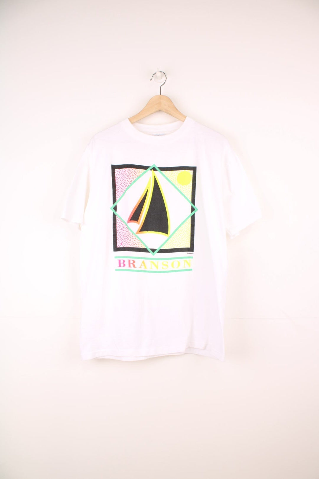 1990 Wellington Apparel Sport tee with puff print geometric graphic in neon colours and 'BRANSON' spellout. 