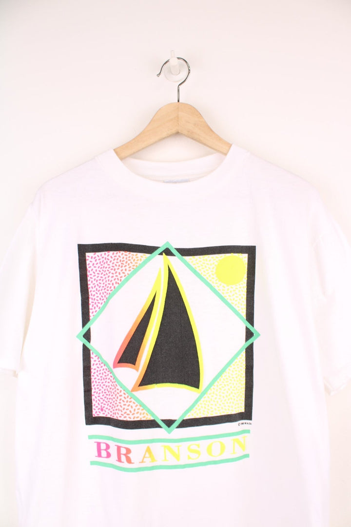 1990 Wellington Apparel Sport tee with puff print geometric graphic in neon colours and 'BRANSON' spellout. 