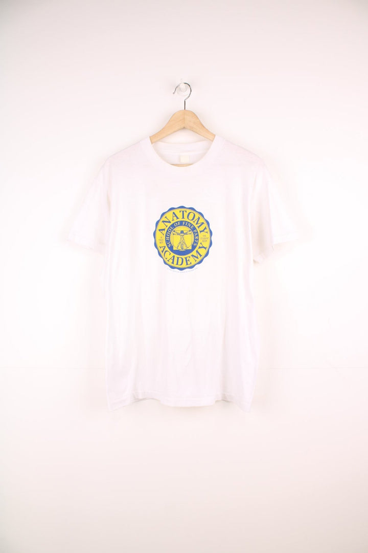 1988 Anatomy Academy tee with Vitruvian man graphic and blue and yellow seal logo reading 'Anatomy Academy - School of Fine Parts, in touch woth the student body'. 