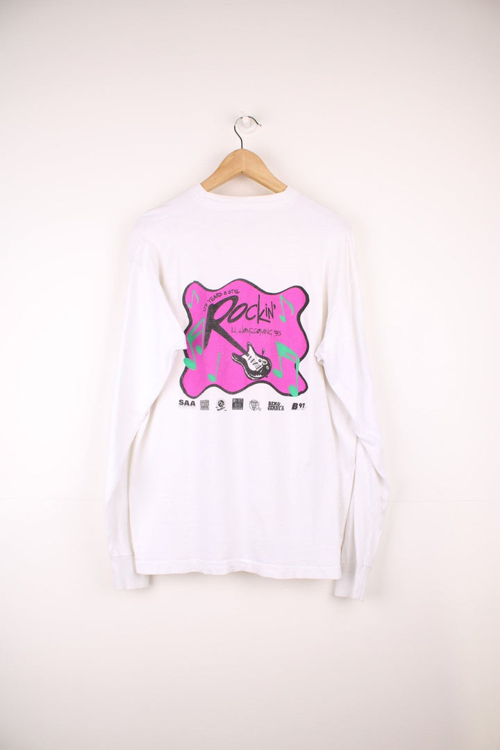 Vintage 1995 "Rokin' Homecoming" long sleeve top, features printed spell-out graphic on the front and back 