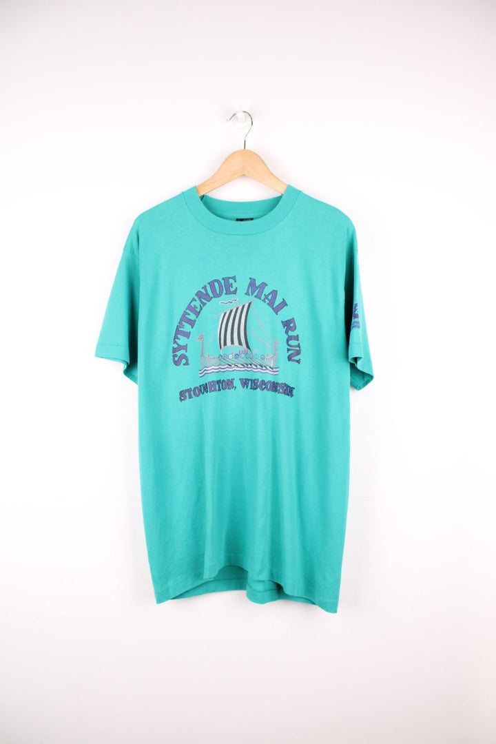 Vintage 90s Syttende Mai Run, Stoughton Wisconsin single stitch T-Shirt in a turquoise green and purple colourway.