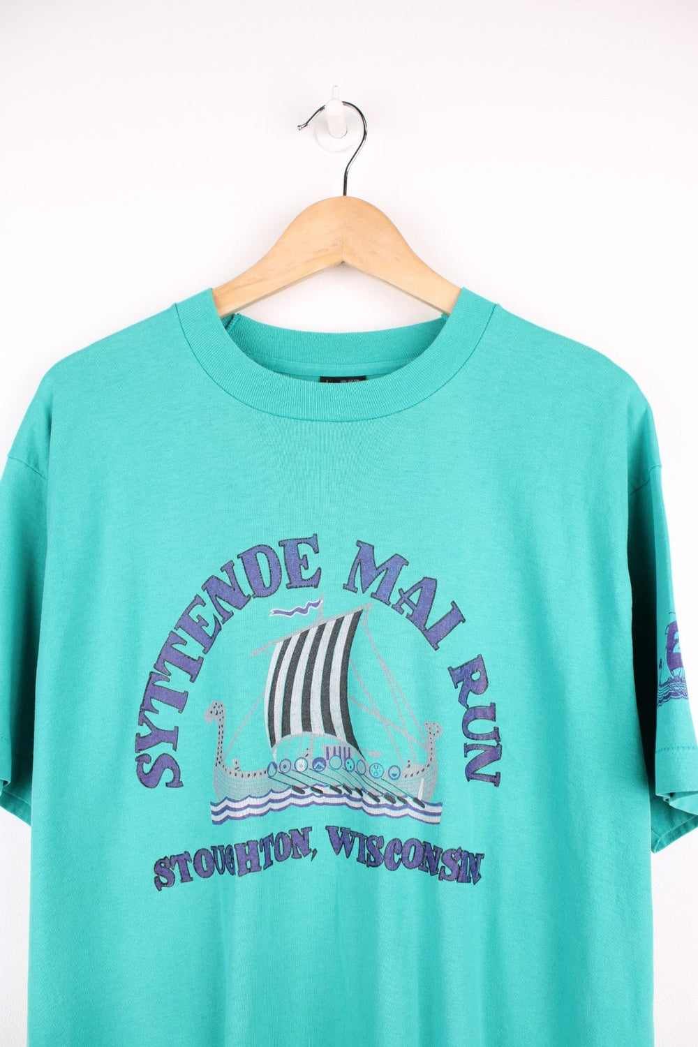 Vintage 90s Syttende Mai Run, Stoughton Wisconsin single stitch T-Shirt in a turquoise green and purple colourway.