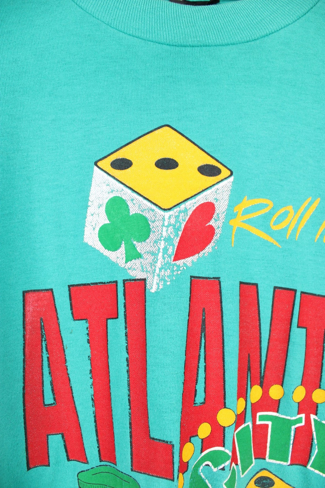 Vintage 90s Roll into Atlantic City single stitch graphic T-Shirt in a turquoise green colourway. 