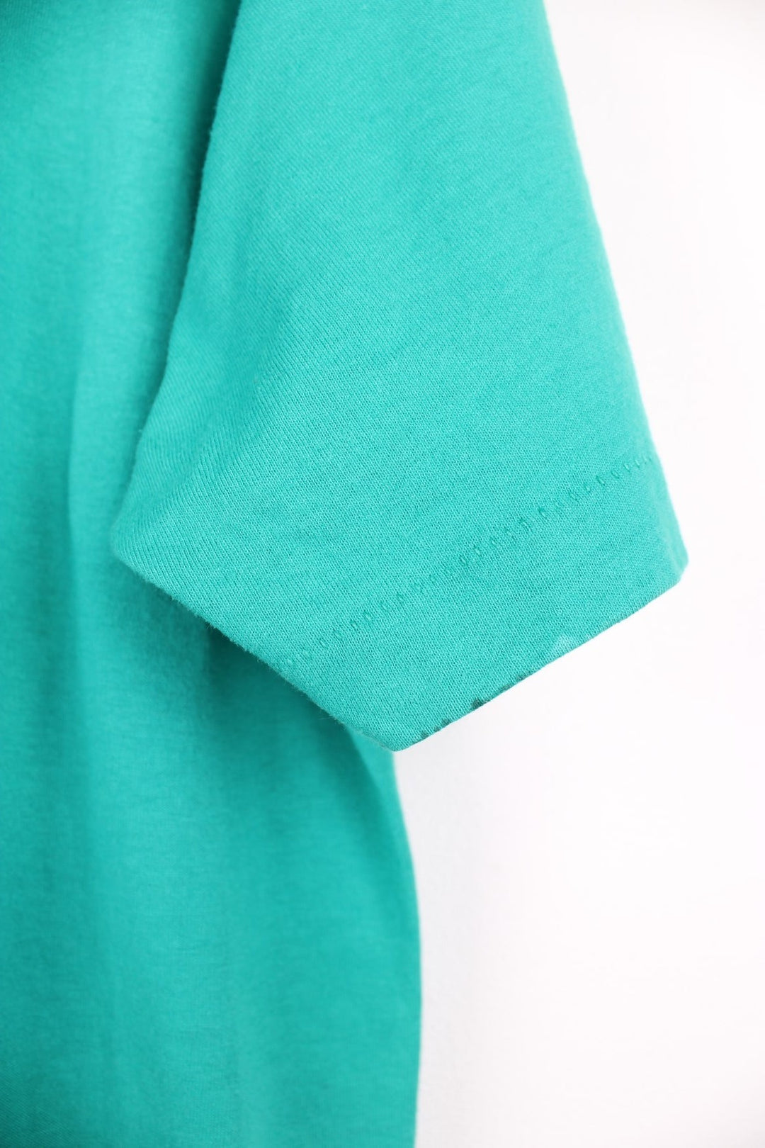 Vintage 90s Roll into Atlantic City single stitch graphic T-Shirt in a turquoise green colourway. 