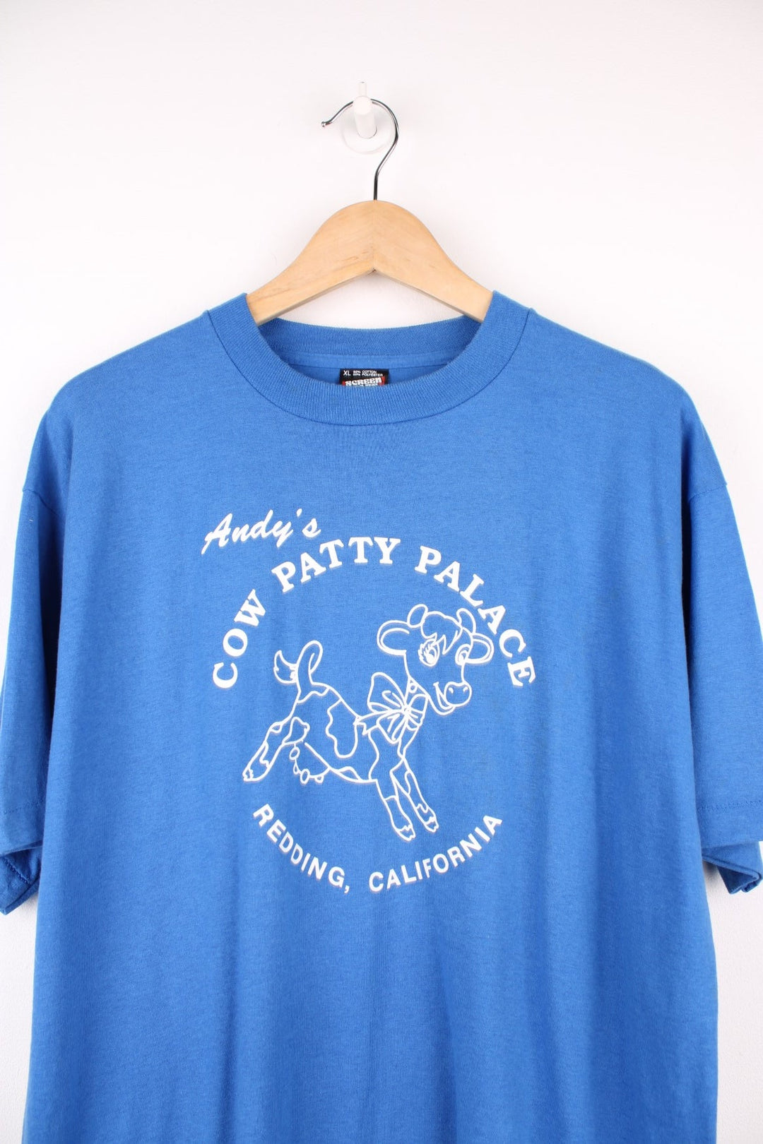 Vintage 80s/90s single stitch T-Shirt with "Andy's Cow Patty Palace Redding, California" print on the front. 