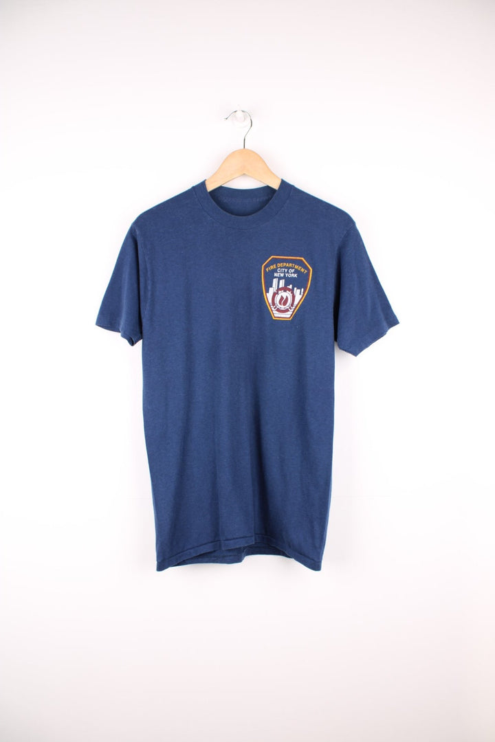 Vintage 80s/90s single stitch T-Shirt with Fire Department, City Of New York print on the chest.