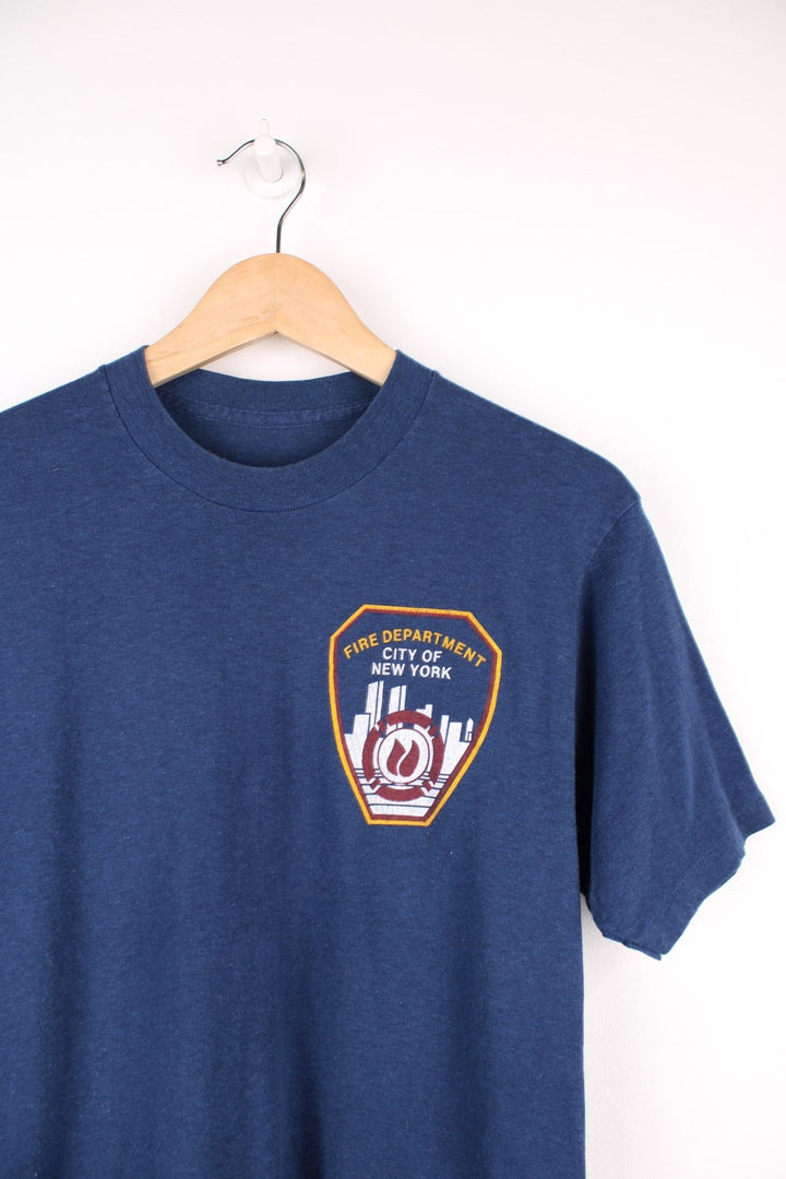 Vintage 80s/90s single stitch T-Shirt with Fire Department, City Of New York print on the chest.