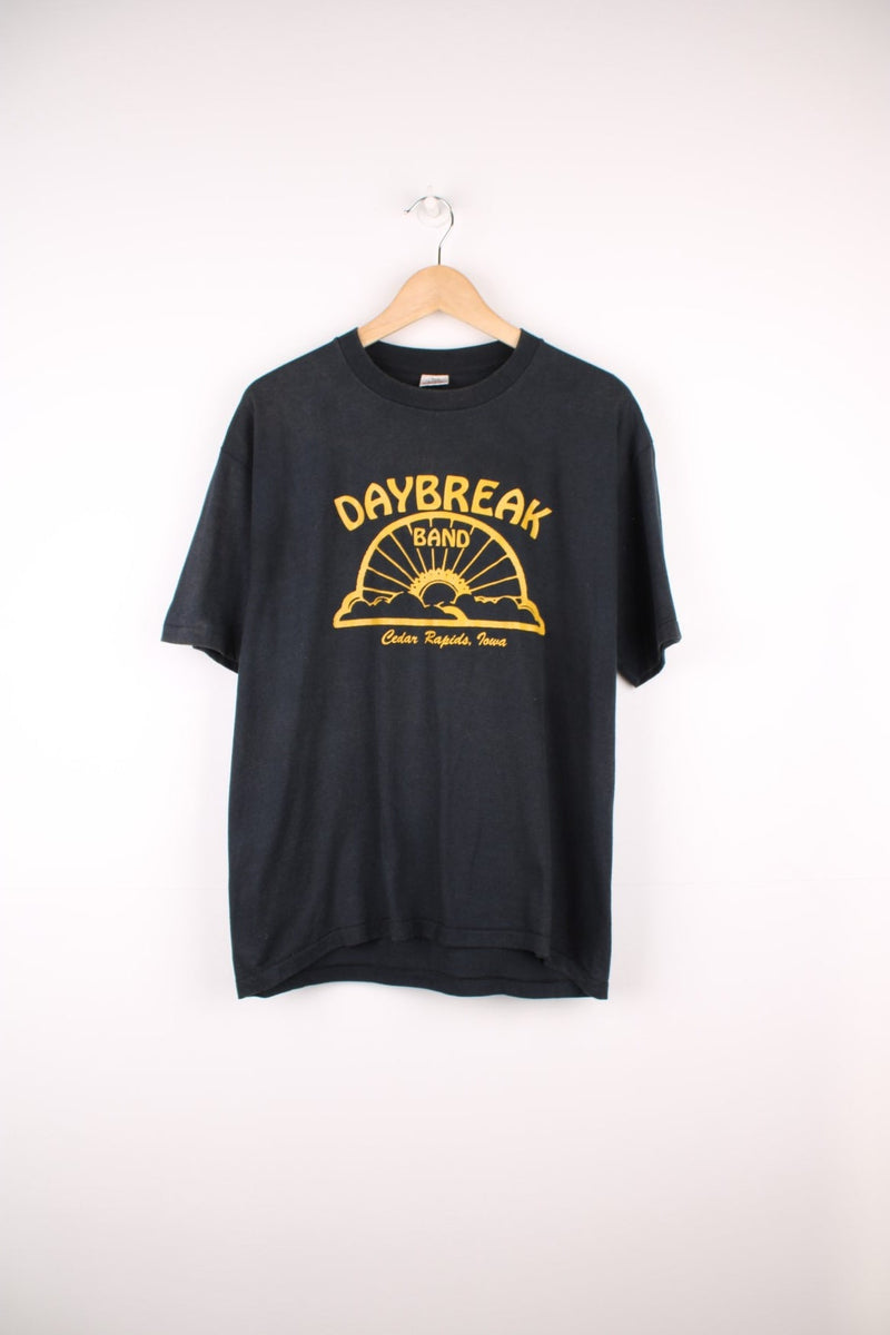 Vintage 90s Cedar Rapids, Lowa single stitch graphic T-Shirt in a black and yellow colorway.