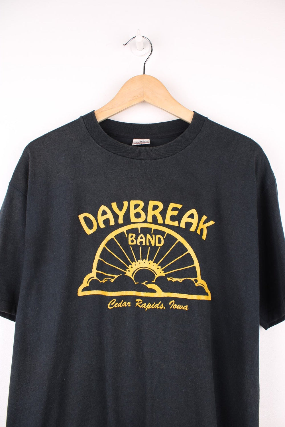 Vintage 90s Cedar Rapids, Lowa single stitch graphic T-Shirt in a black and yellow colorway.