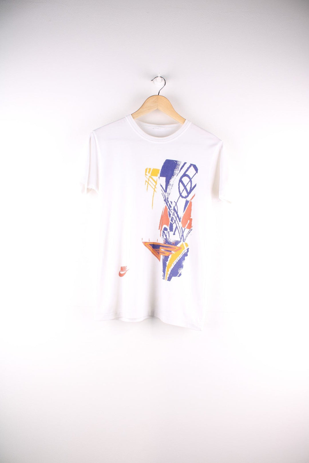 Vintage 90s Nike Flight T-Shirt in a white colourway with a large graphic on the front, and single stitch hem.  