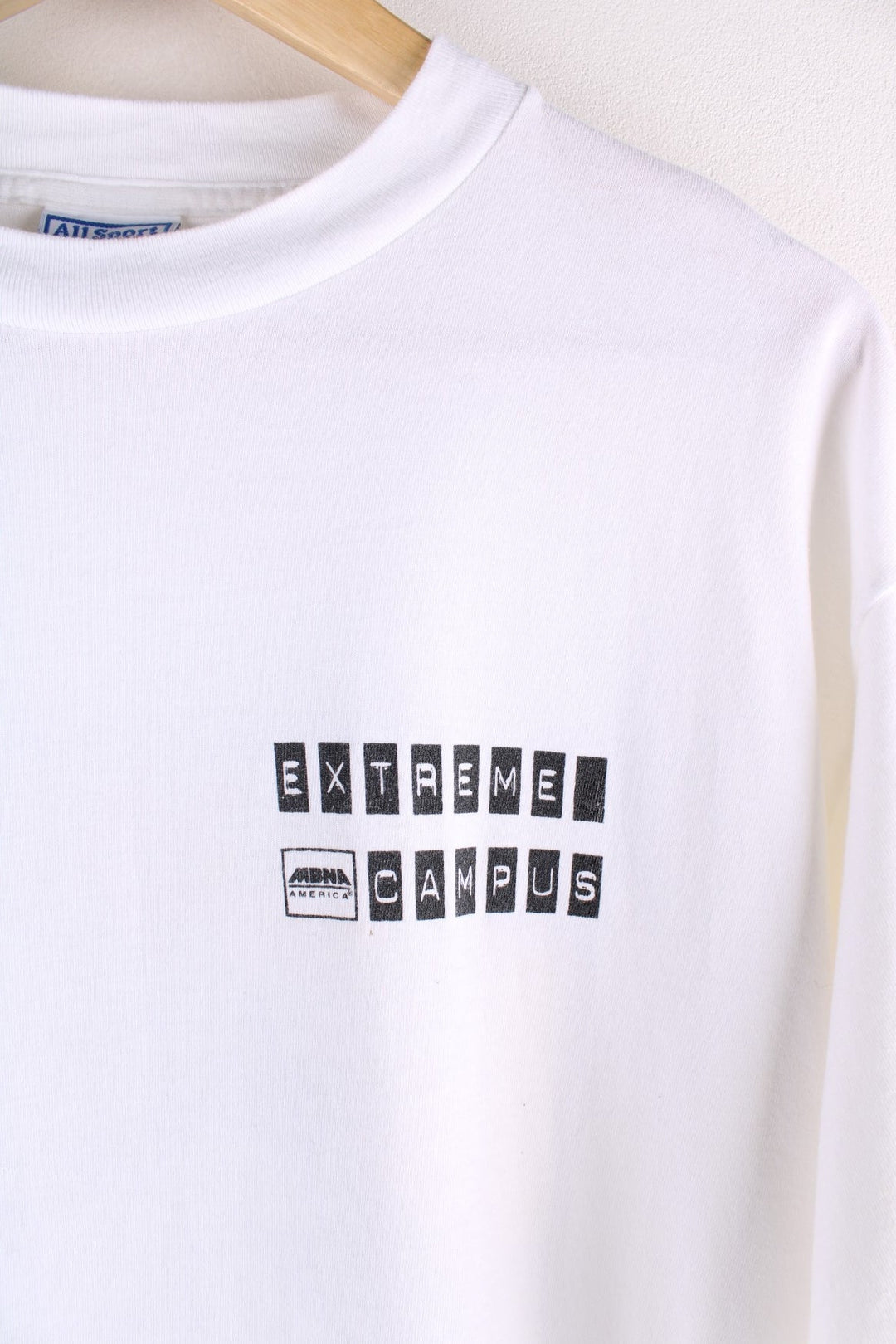  Vintage Extreme Campus T Shirt in a white colourway with a small logo printed on the front, and large graphic on the back. Single Stitch hem, made in the USA.  