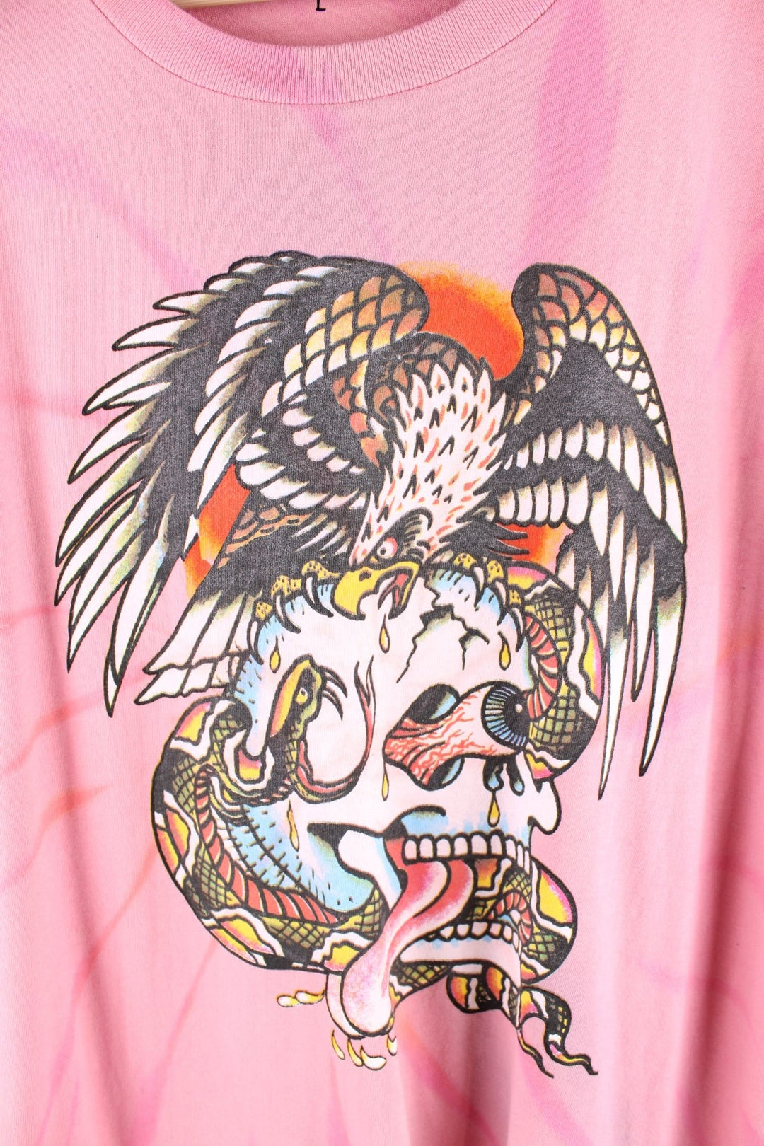 Vintage Ed Hardy T-Shirt in a pink colourway with a large graphic on the front, 'painted by Ed' on the back with a single stitch hem.  