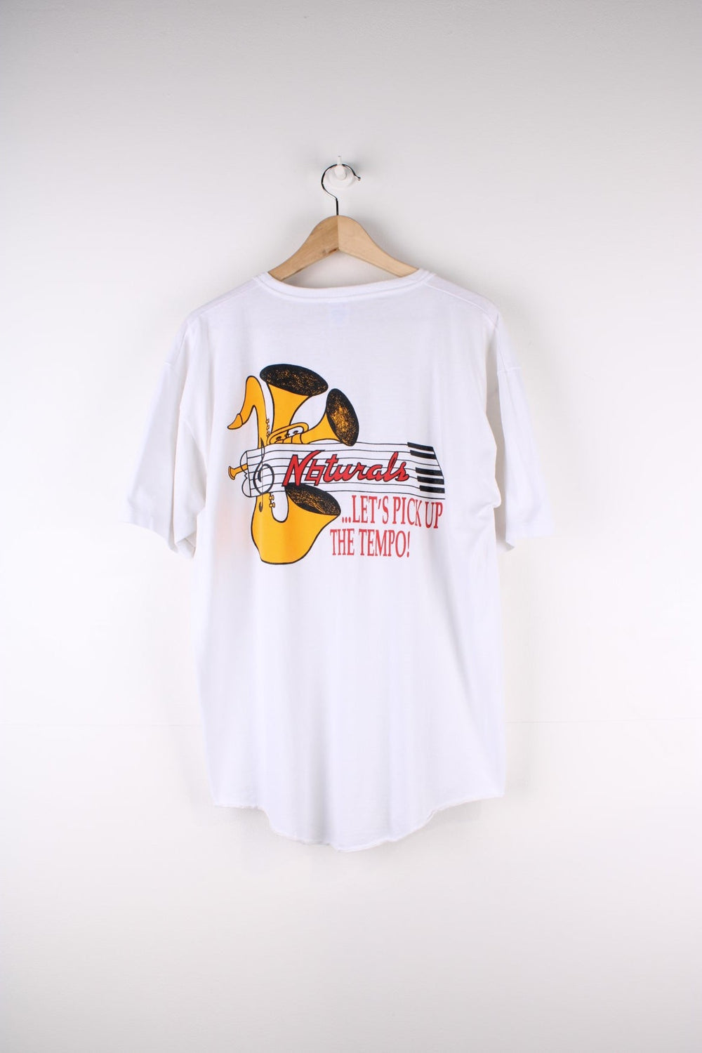 Vintage Mississipi College Naturals Band Single Stitch T-Shirt in a white colourway, has a button up collar, the logo printed on front and on the back a trumpet graphic on the back.