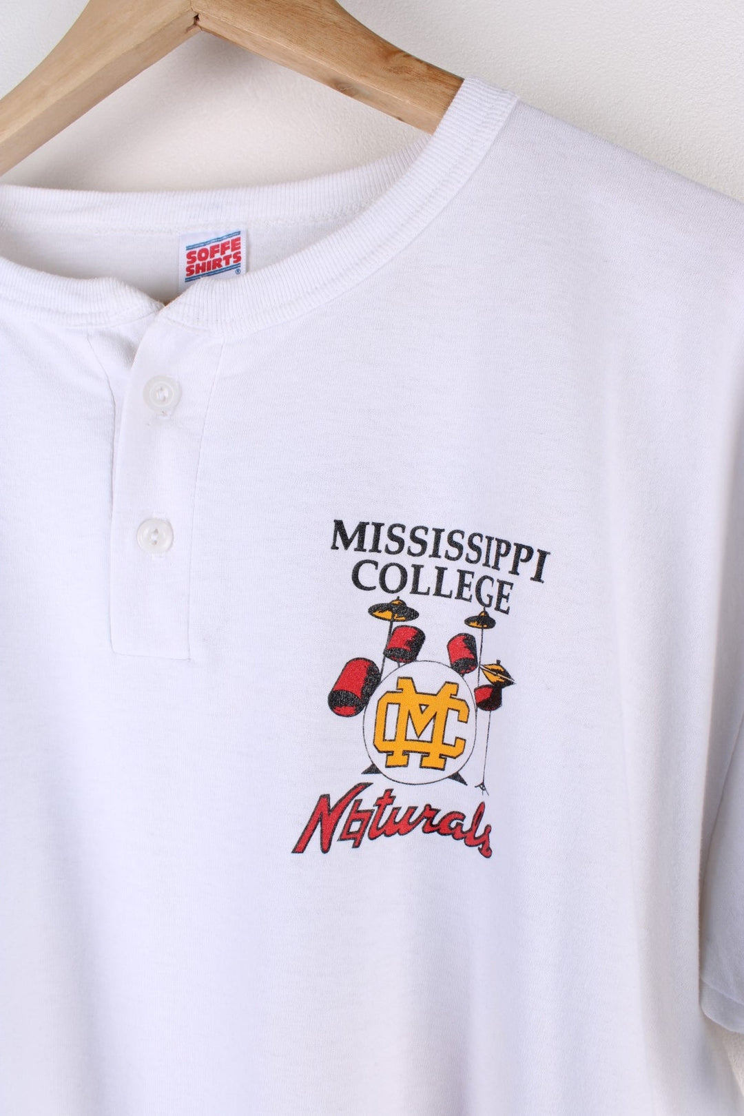 Vintage Mississipi College Naturals Band Single Stitch T-Shirt in a white colourway, has a button up collar, the logo printed on front and on the back a trumpet graphic on the back.