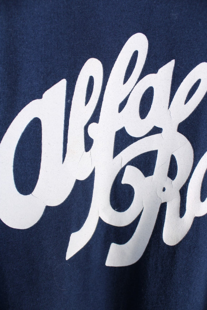 Vintage 90's Alfa Romeo Logo Single Stitch T-Shirt in a blue colourway with the spell out logo printed across the front.