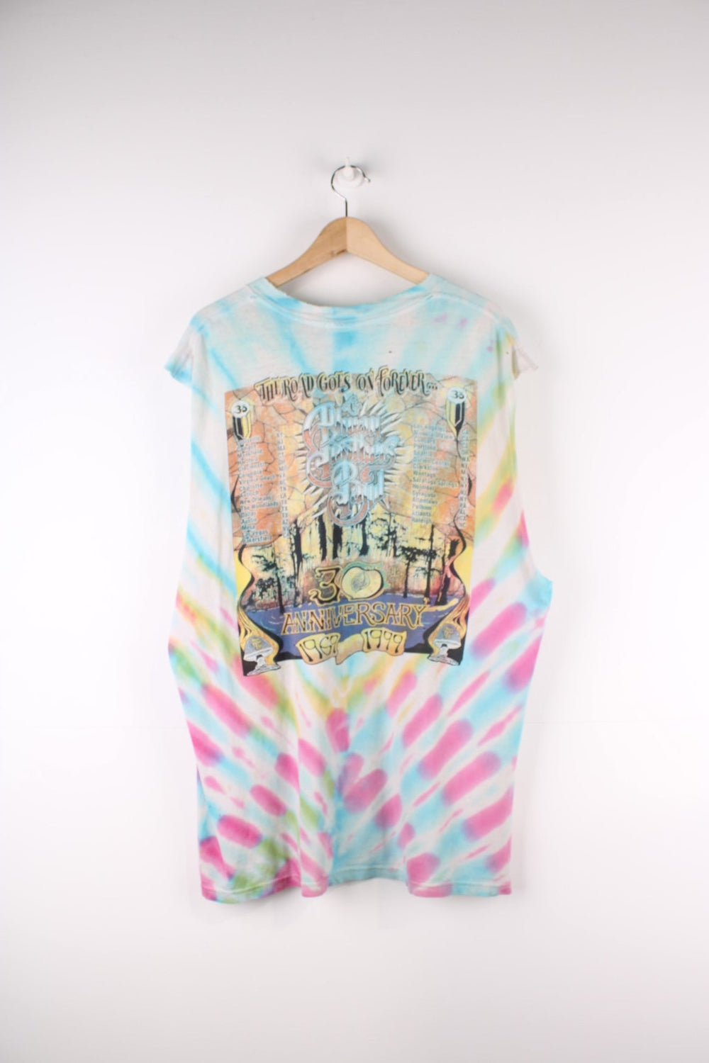 Vintage 90's The Allman Brothers Band 30 Years On The Road, Thrashed Vest in a multicoloured Tie Dye colourway a mushroom graphic printed on front and all the tour dates on the back.