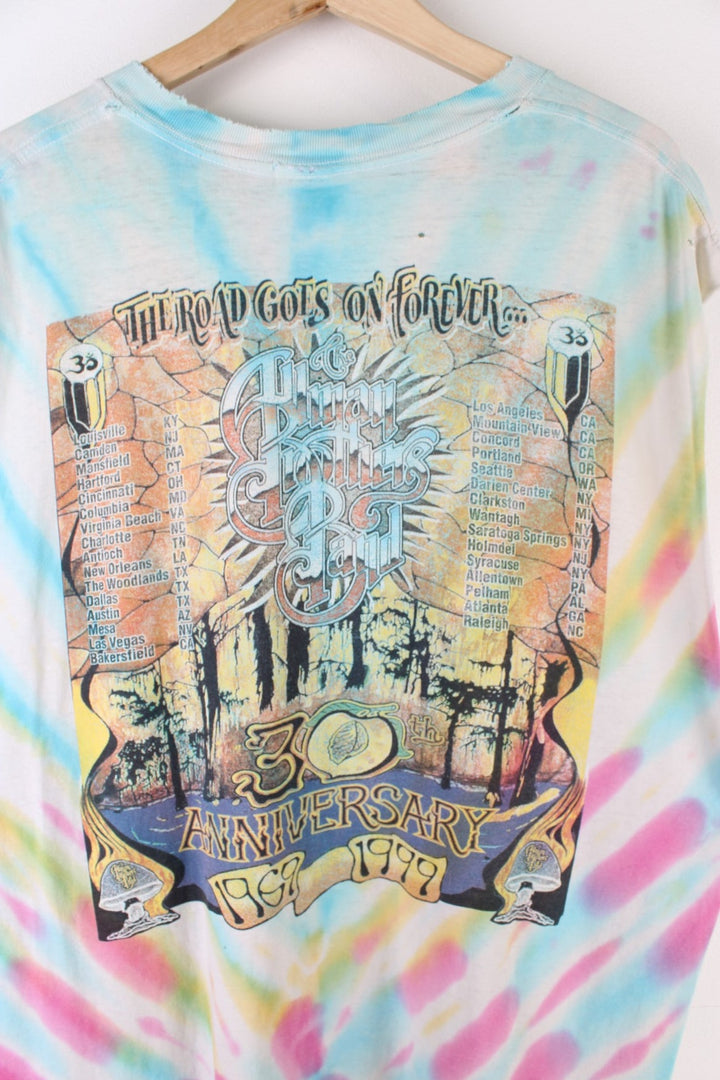 Vintage 90's The Allman Brothers Band 30 Years On The Road, Thrashed Vest in a multicoloured Tie Dye colourway a mushroom graphic printed on front and all the tour dates on the back.