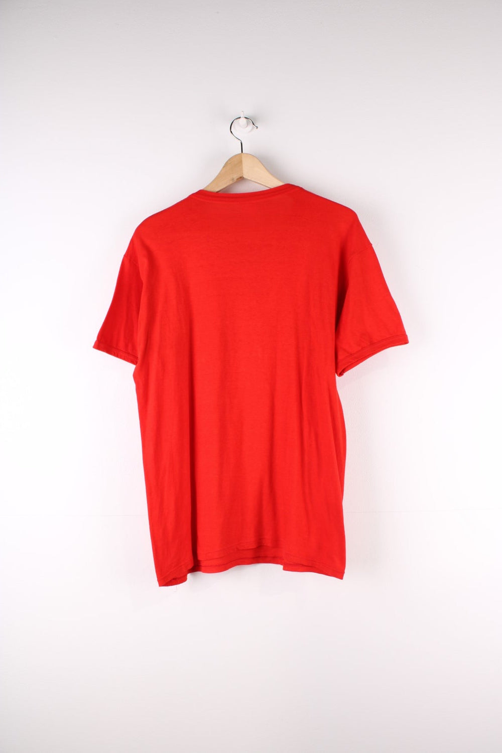 Vintage 80's Coca Cola Graphic T-Shirt in a red colourway with the spell out logo puff printed on the front.