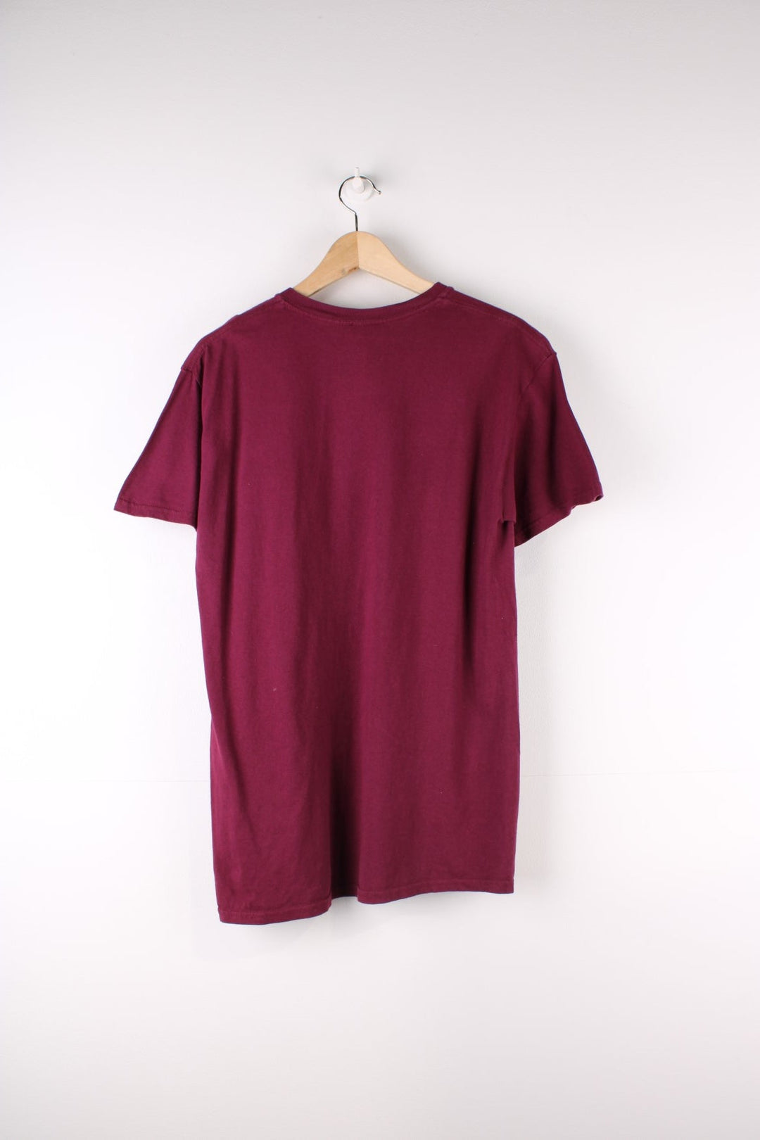 Thrasher Skateboarding T-Shirt in a maroon red colourway with the spell out logo printed across the front.