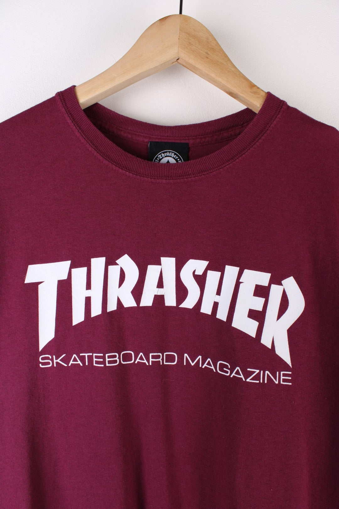 Thrasher Skateboarding T-Shirt in a maroon red colourway with the spell out logo printed across the front.