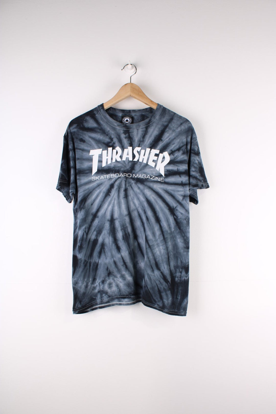 Thrasher Tie Dye T-Shirt in a blue and black colourway with the spell out logo printed across the front.