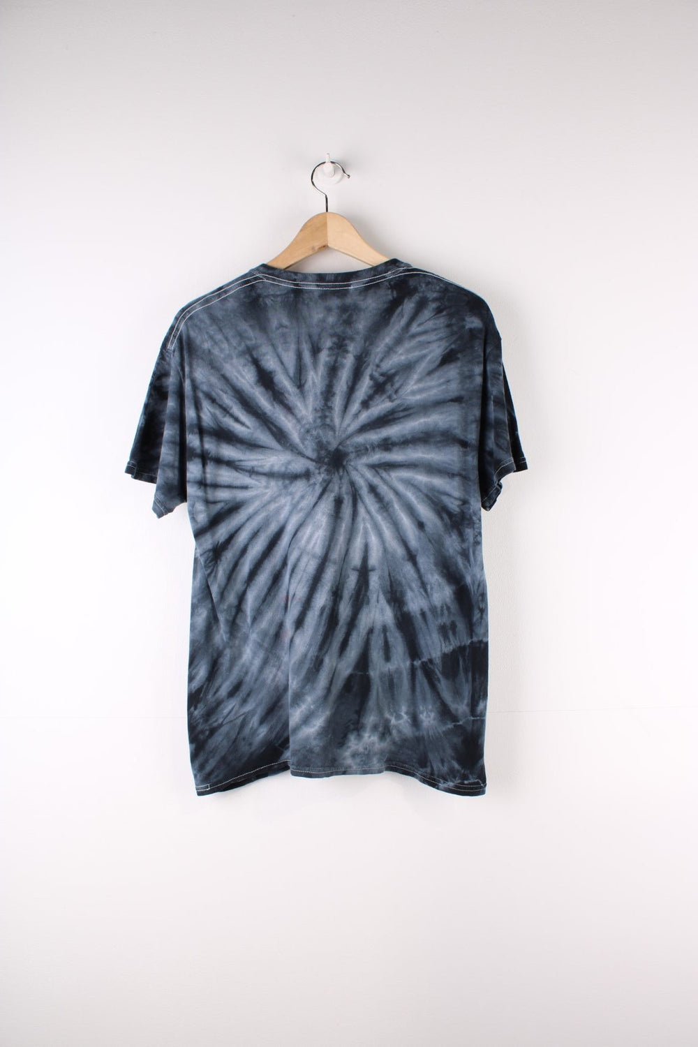 Thrasher Tie Dye T-Shirt in a blue and black colourway with the spell out logo printed across the front.