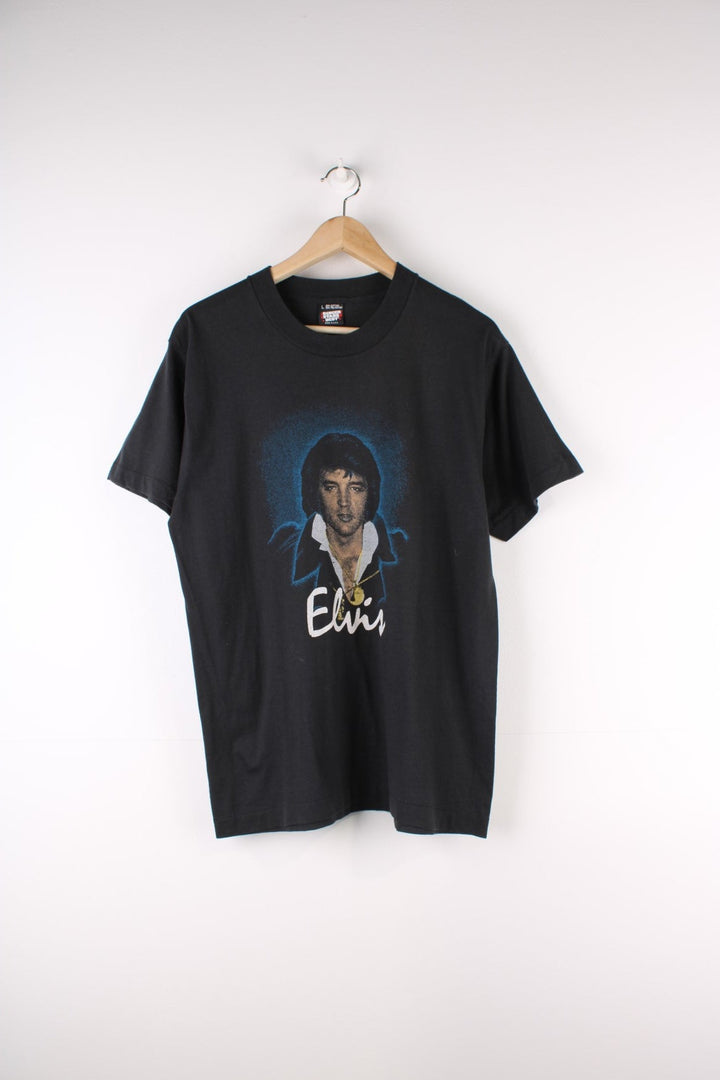 Vintage 70's Elvis Presley Single Stitch T-Shirt in a black colourway with Elvis graphic and spell out printed on the front.