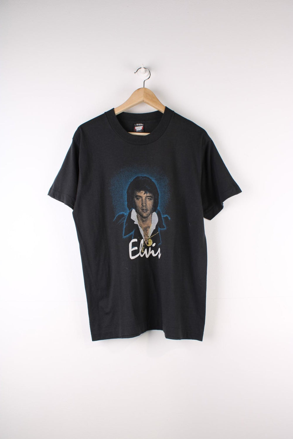 Vintage 70's Elvis Presley Single Stitch T-Shirt in a black colourway with Elvis graphic and spell out printed on the front.