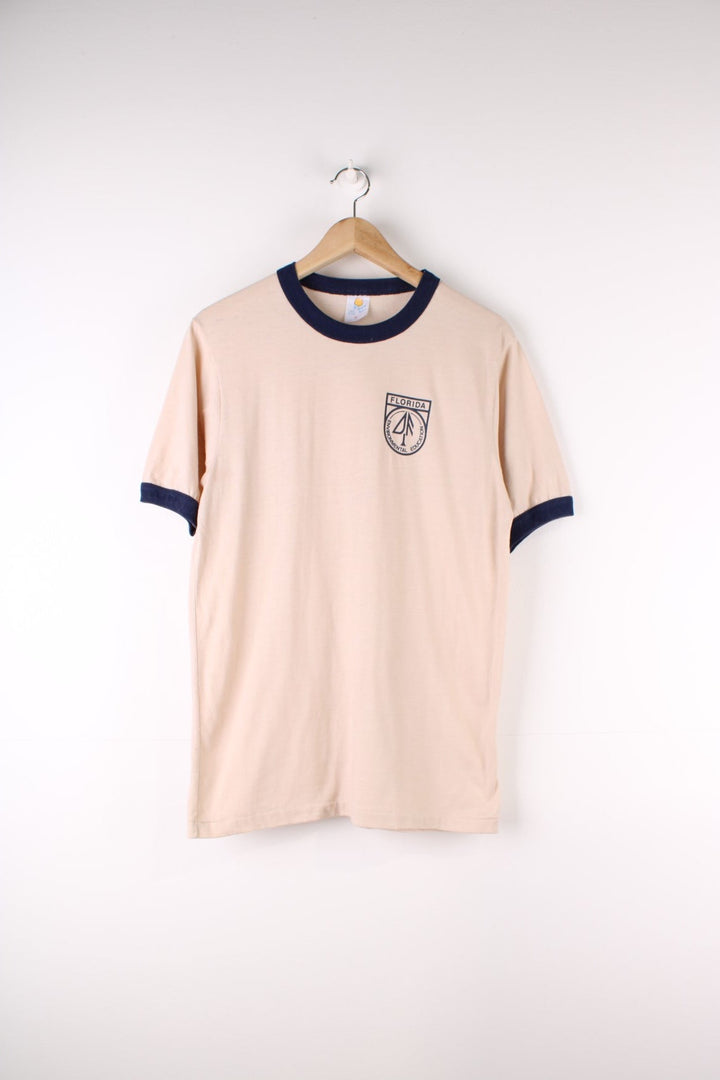 Vintage 70's Florida Environmental Education Ringer T-Shirt in a tan colourway with the logo printed on the front.