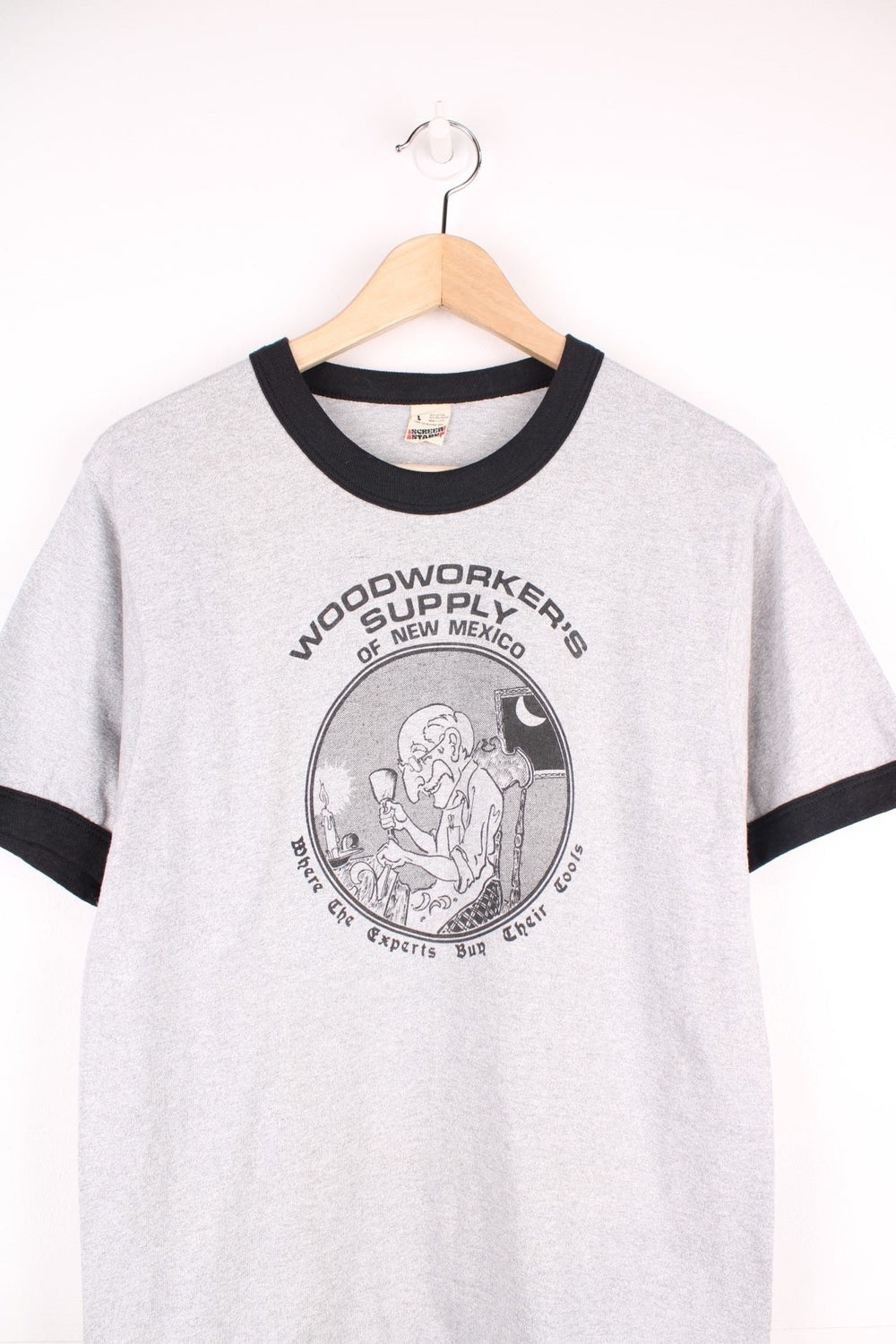 Vintage 70's Woodworkers Supply Of New Mexico Graphic T-Shirt in a grey and black colourway with a graphic print across the front. 