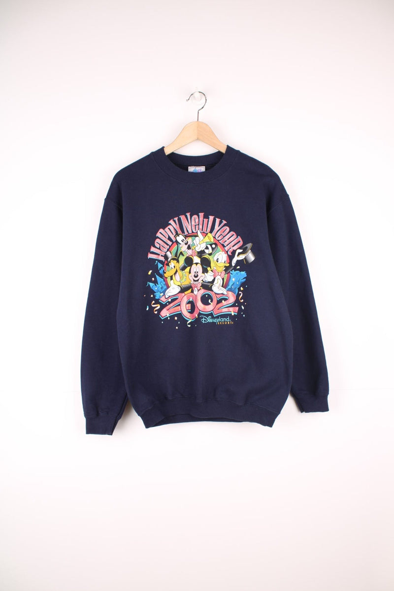 Disneyland 2002 Happy New Year Sweatshirt in a blue colourway with a big cartoon print of all the characters on the front. 