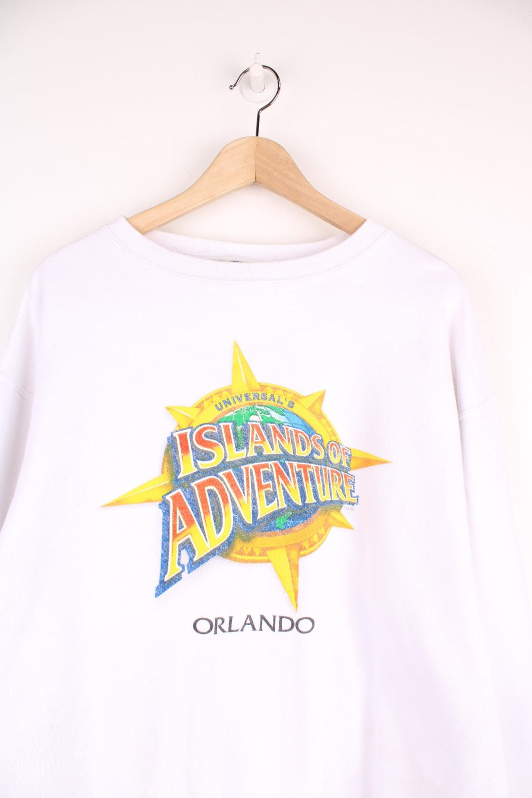 Vintage Universal Studios, Islands Of Adventure Orlando Sweatshirt in a white colourway with the logo printed on the front.  