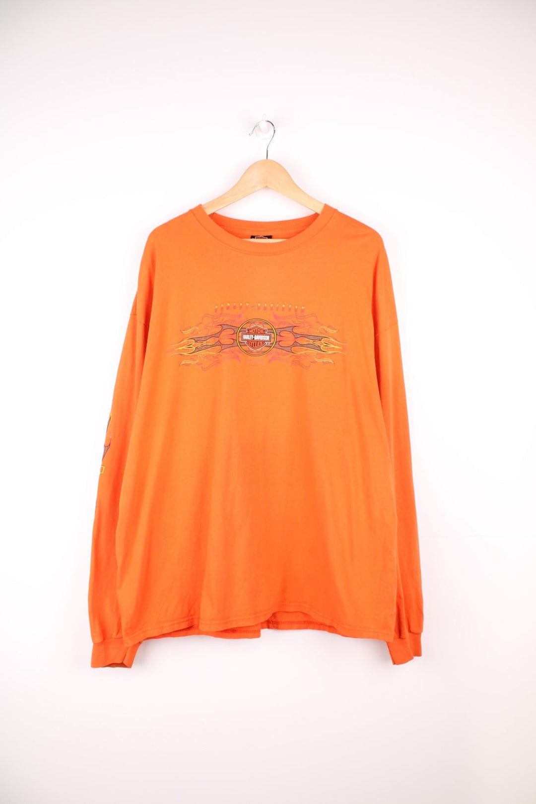 Harley-Davidson Jamestown orange long sleeve top with printed graphic on the front, back and sleeves