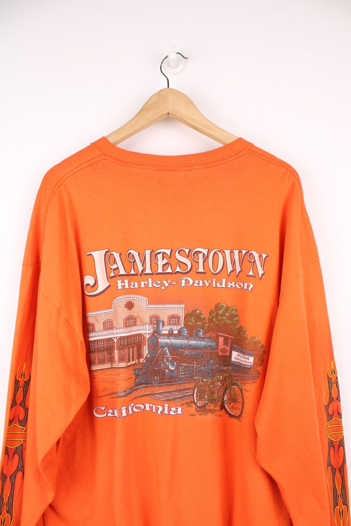 Harley-Davidson Jamestown orange long sleeve top with printed graphic on the front, back and sleeves