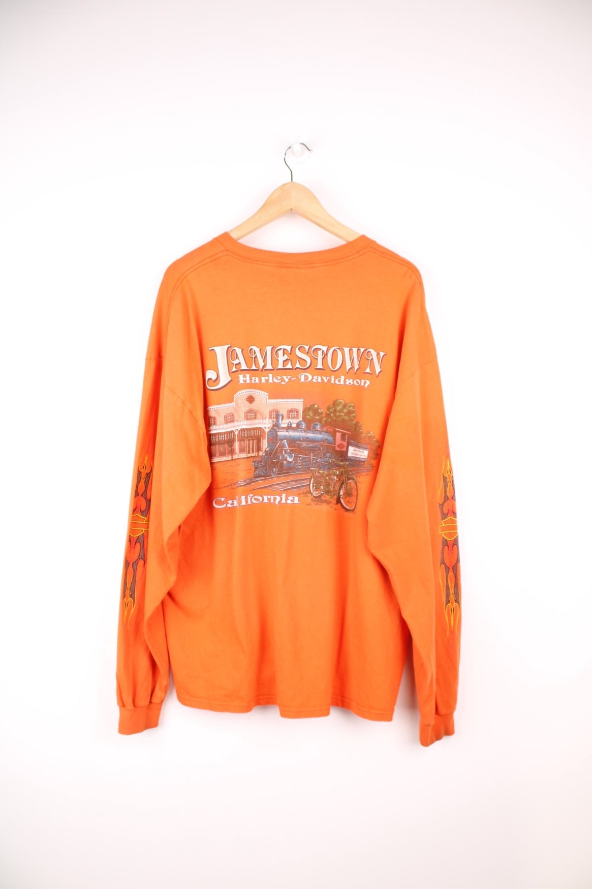 Harley-Davidson Jamestown orange long sleeve top with printed graphic on the front, back and sleeves