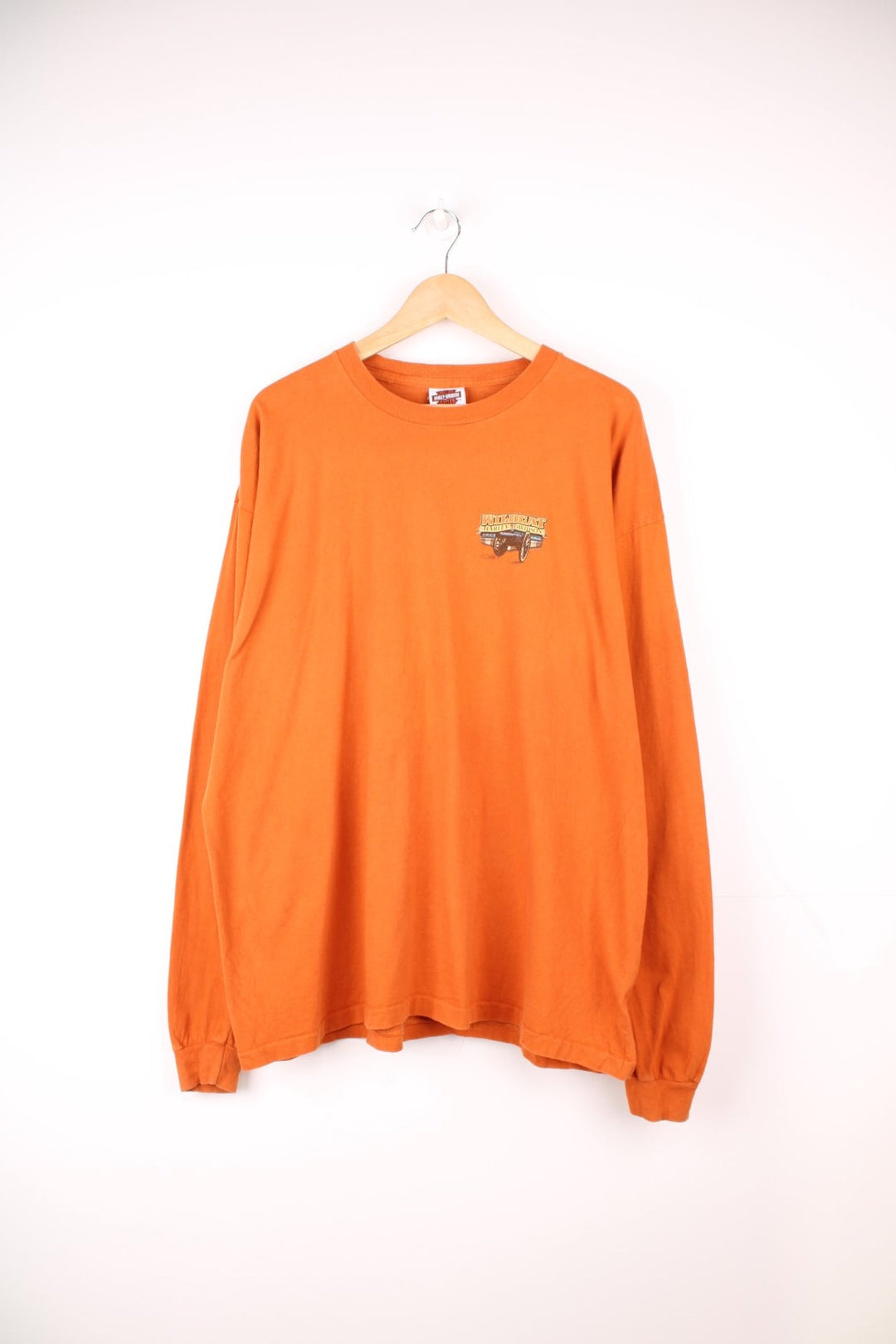 Harley-Davidson Wildcat orange long sleeve top, made in the USA. Features printed graphic on the front and back