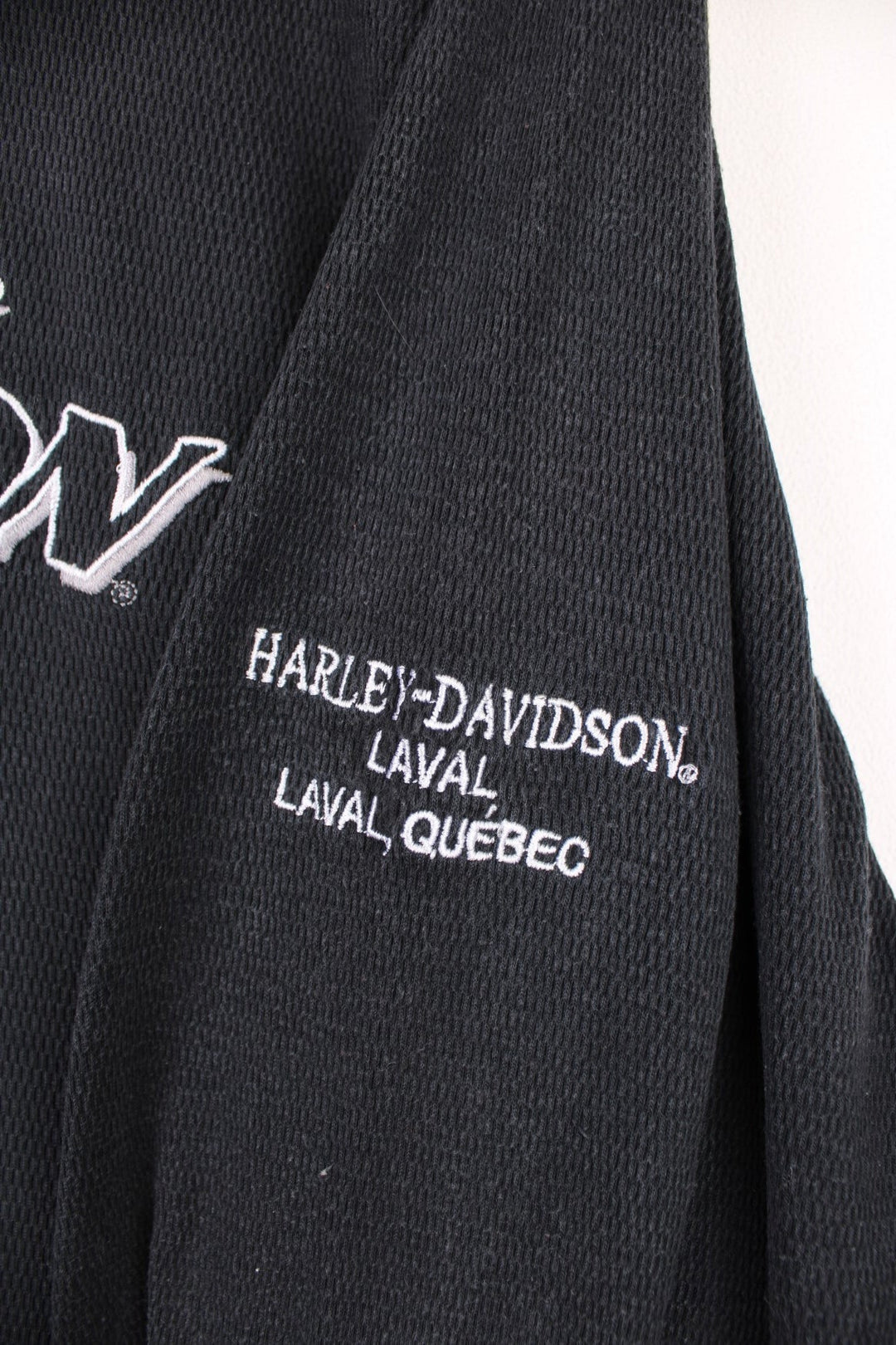 Harley-Davidson long sleeved top with embroidered spell out logo across the chest.