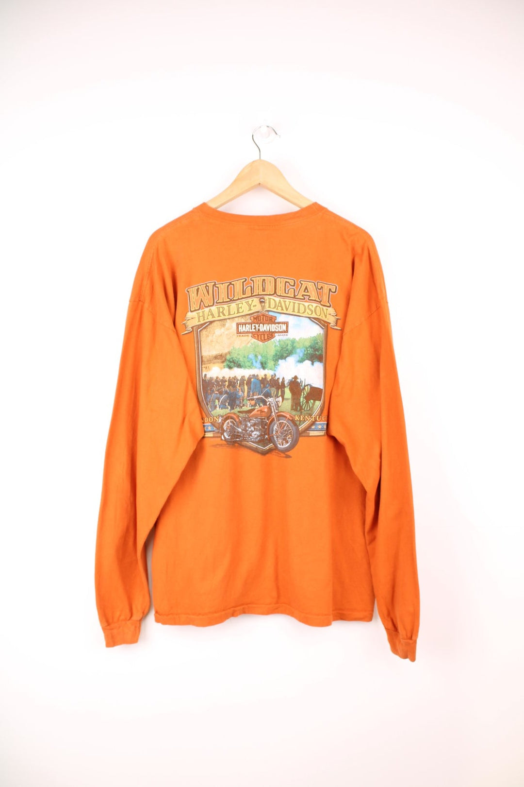 Harley-Davidson Wildcat orange long sleeve top, made in the USA. Features printed graphic on the front and back