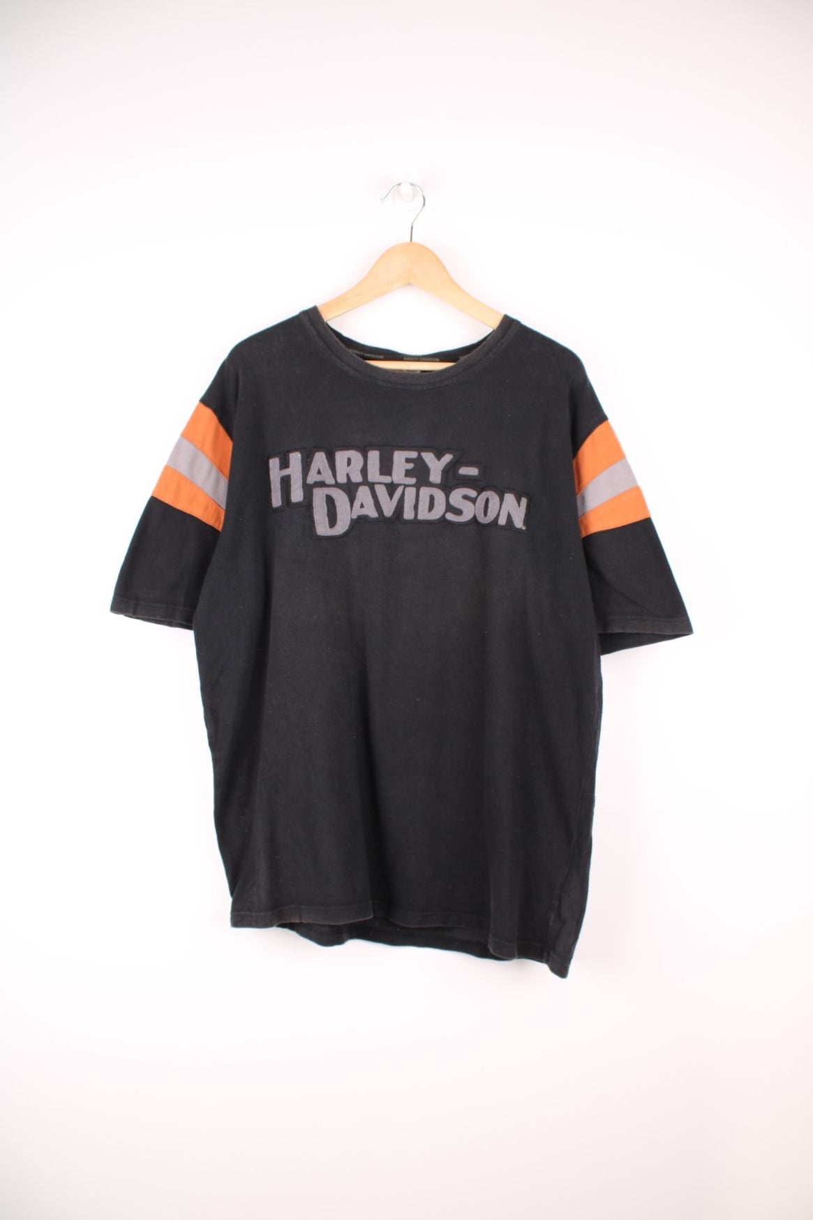 Harley-Davidson black and orange heavy weight polo style t-shirt with embroidered raised lettering 