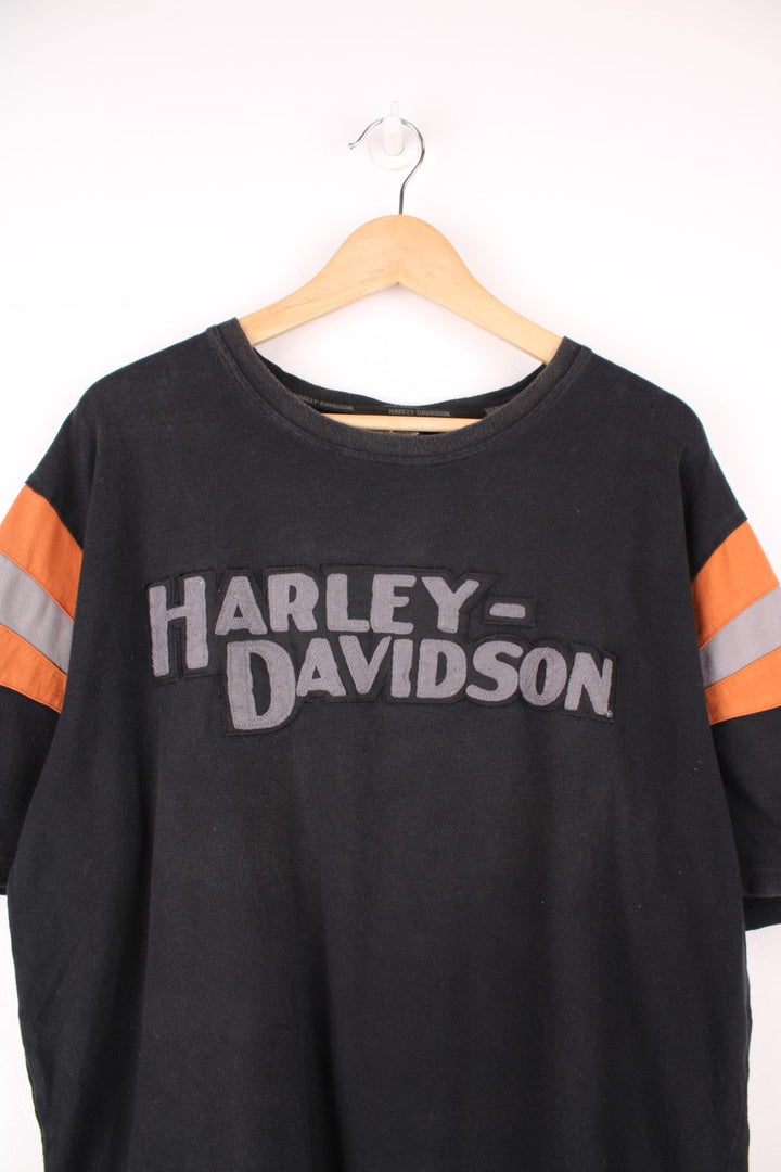 Harley-Davidson black and orange heavy weight polo style t-shirt with embroidered raised lettering 