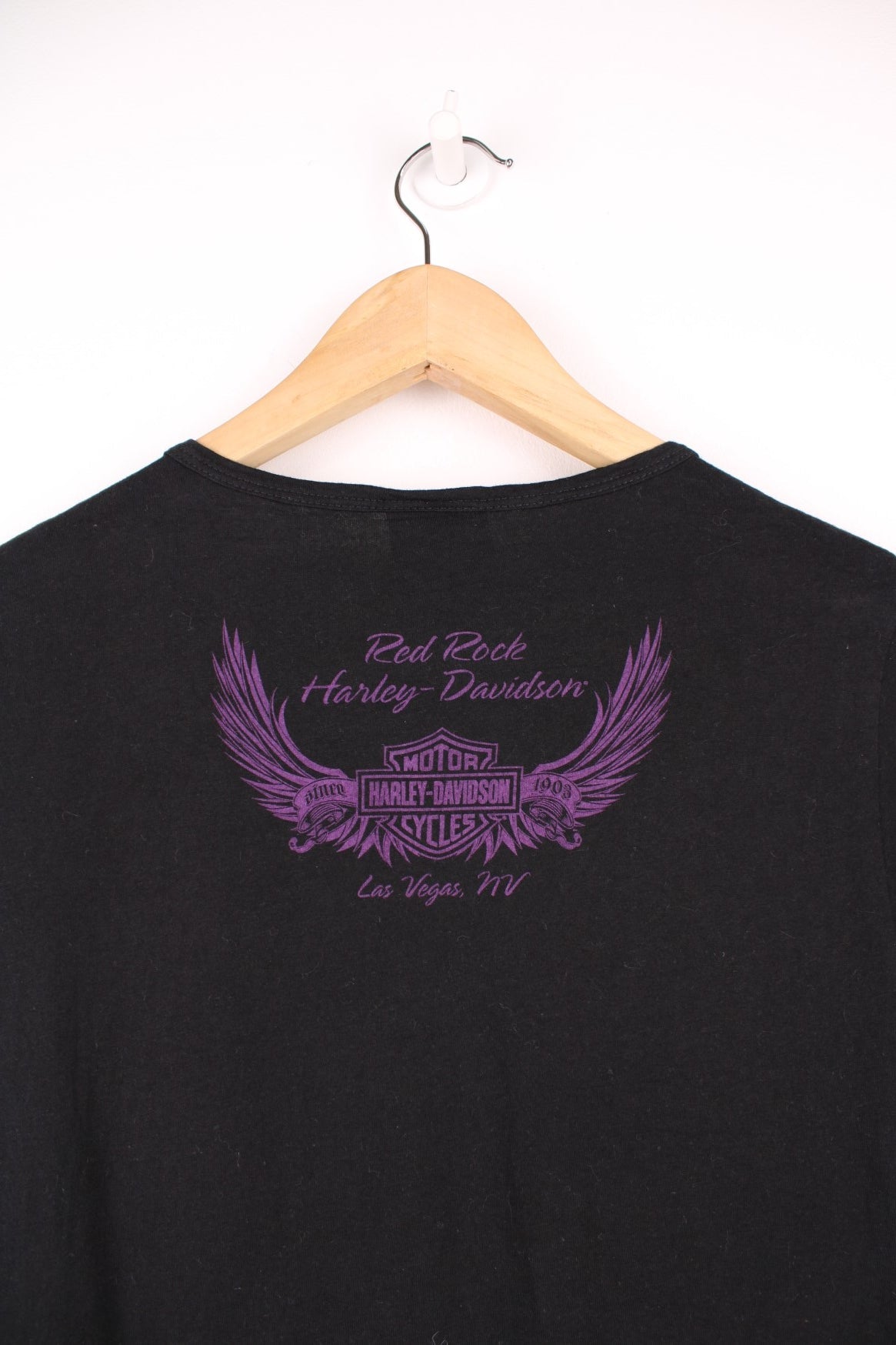 Harley-Davidson all black baby tee with glittery spell-out graphic on the front and spell-out detail below the back of the neck line