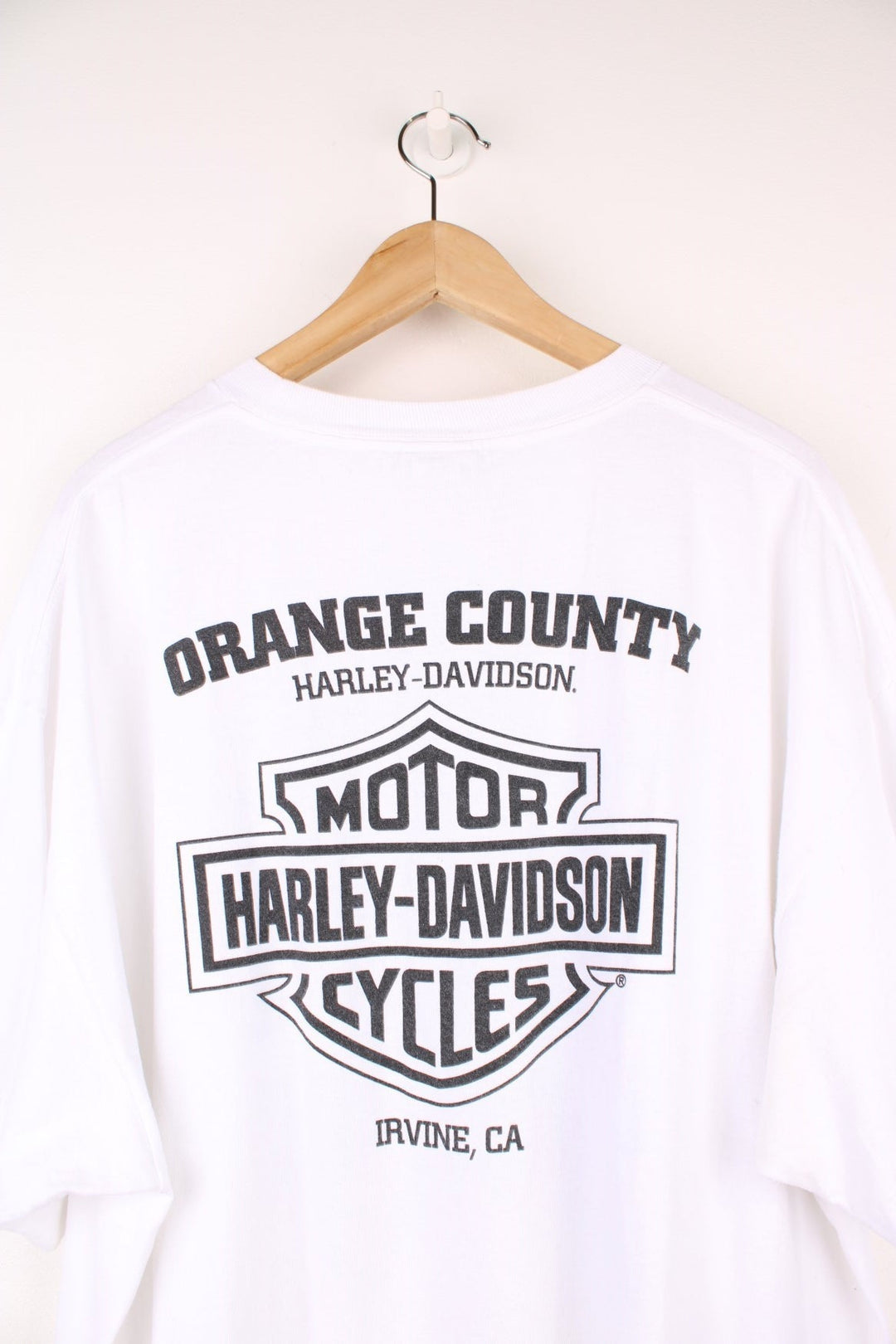 Harley-Davidson, Orange County, Irvine T-Shirt with graphic print and spell out logo on the front and back.