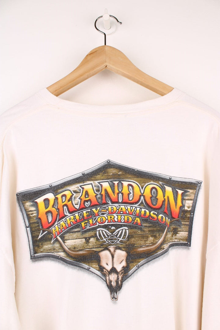 2013 Harley-Davidson Brandon, Florida long sleeved T-Shirt in an off white/light beige colourway. Features spell out logo and graphic print on the front and back, and logo on each sleeve.