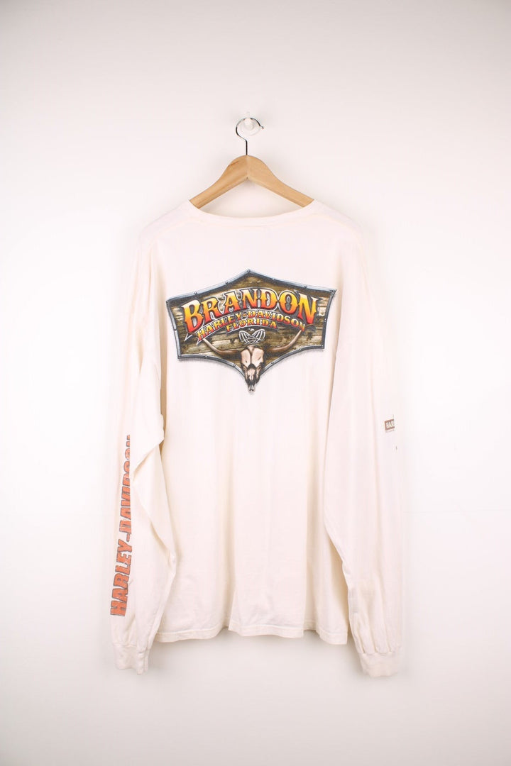 2013 Harley-Davidson Brandon, Florida long sleeved T-Shirt in an off white/light beige colourway. Features spell out logo and graphic print on the front and back, and logo on each sleeve.