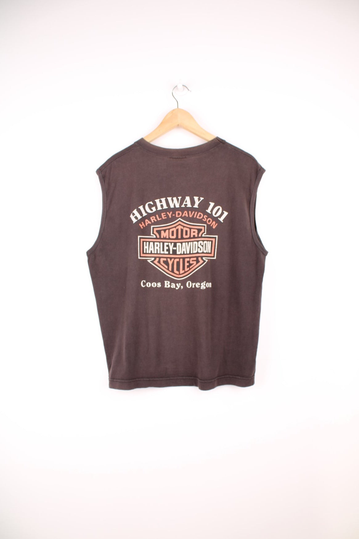 Vintage Harley-Davidson Highway 101, Coos Bay Oregan faded brown muscle vest with printed graphics on the front and back